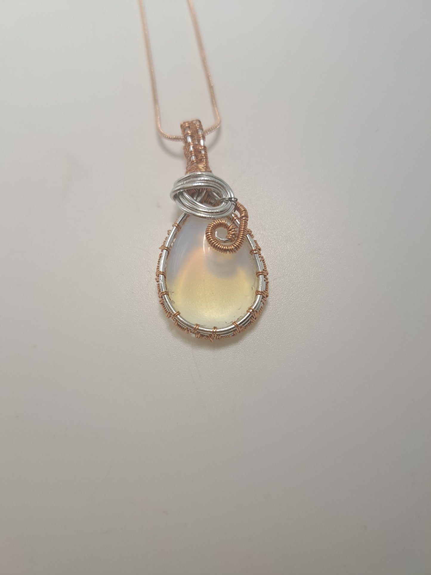 Opal Wrapped Stone